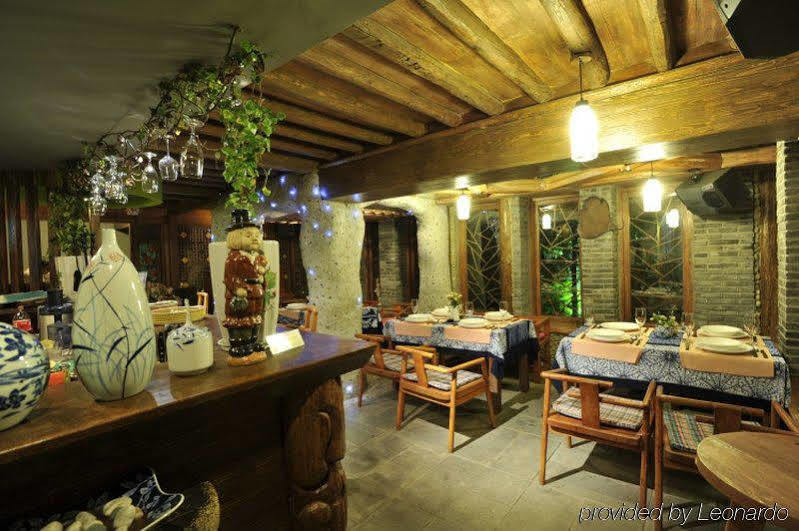 Blossom Hill Inn - Neverland Li-ťiang Restaurace fotografie